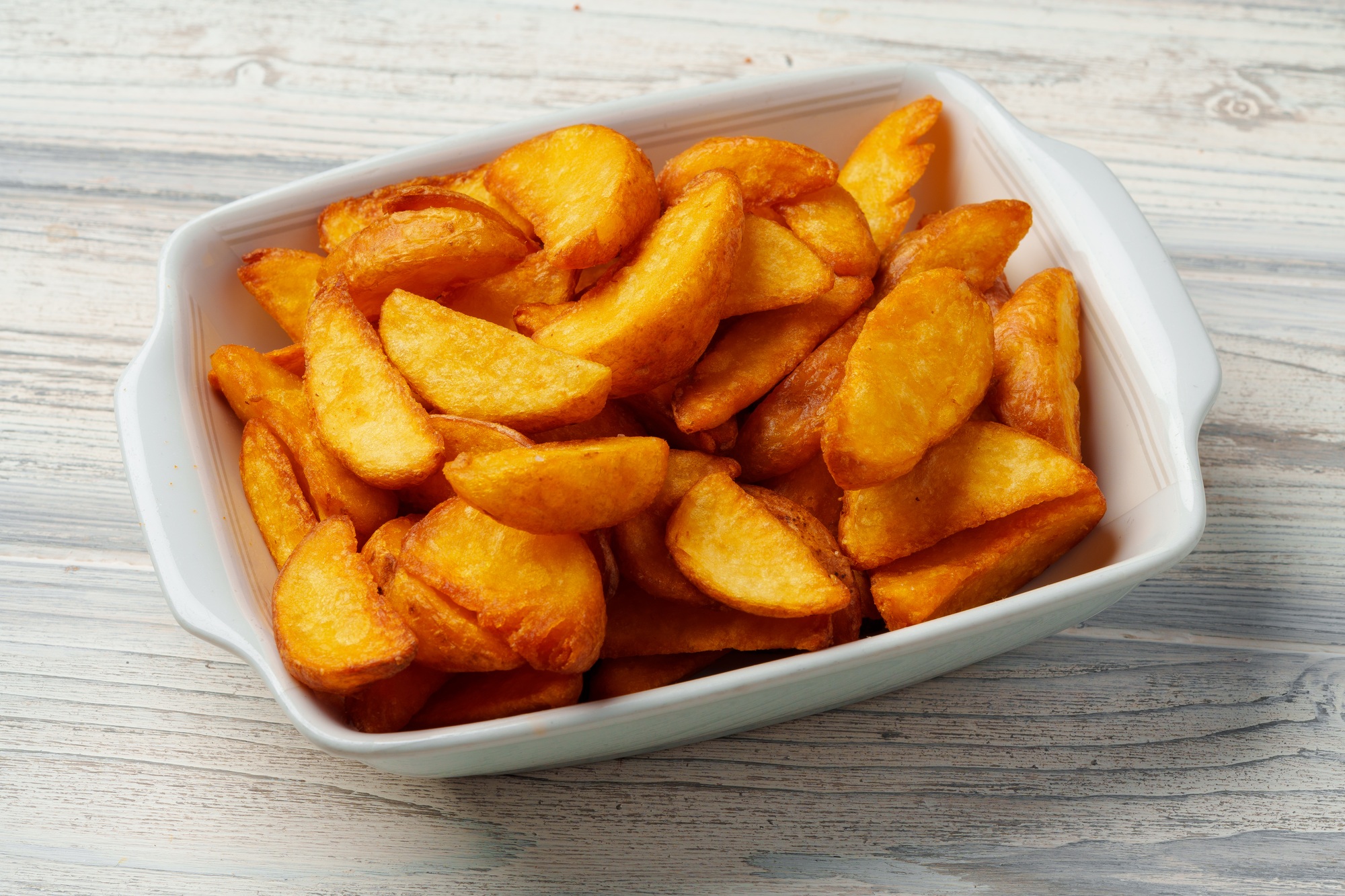 Potetbåter i airfryer – sprø og gyldne med smakfull krydring.